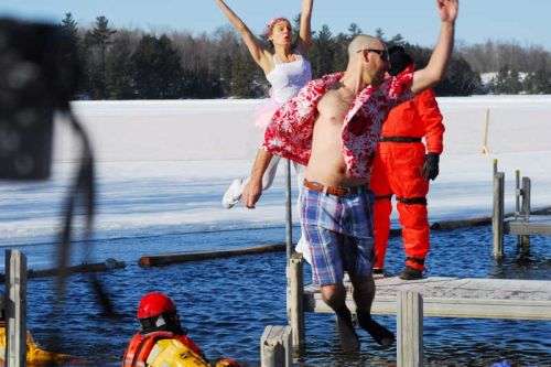 Modern dance? Rob Moore, foreground dold water at the third annual Polar bear Plunge at the Frontenac Heritage Festival on Sunday.